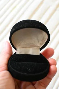 Empty ring box in hand Фото