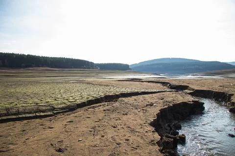 Empty river. Drought land texture, summers dry, cracked soil, ground on the 스톡 사진