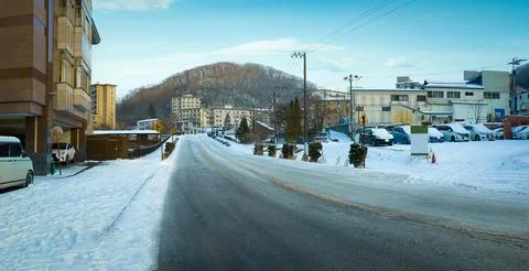 Empty road with beautiful winter small town Stock Photos