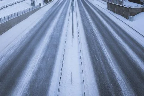 Empty road in city at winter Stock Photos