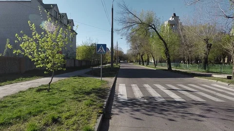 Empty road of the city's streets on a warm spring day Stock Footage 128302113