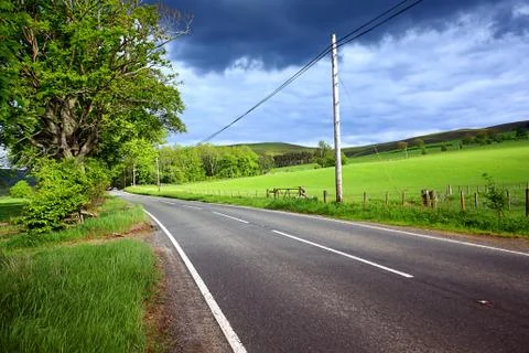 An empty road in the countryside Stock Photos
