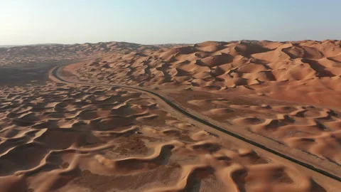 Empty road in desert dunes from above Stock Footage 169815258