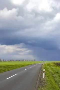 Empty road with dramatic sky Stock Photos