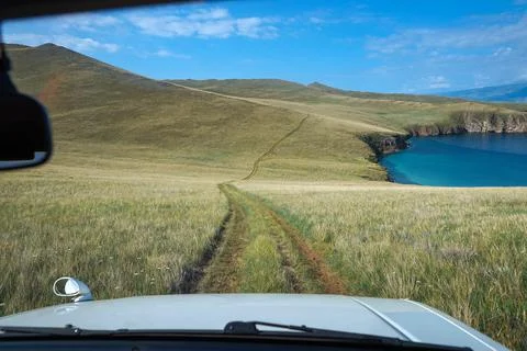 Empty off-road in the fields in the bay Stock Photos
