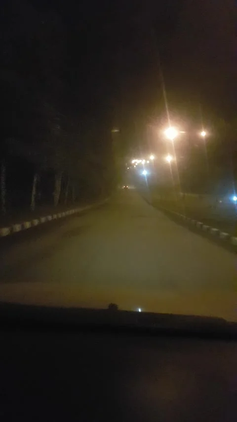 An empty road at midnight 스톡 동영상 293948059