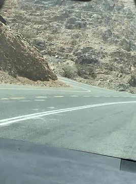 The empty road in the mountain area Stock Photos