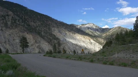 Empty road with mountain at background. Stockbeeldmateriaal 75721988