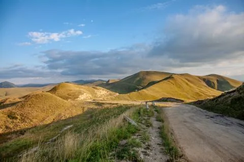 Empty road in mountain landscape Stock Photos