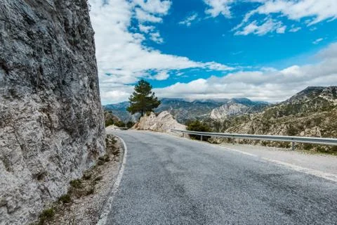 Empty road in mountains Stock Photos