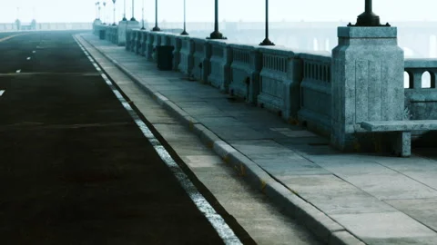 Empty road next to the waterfront with streetlights in the early morning Stock Footage 343547790