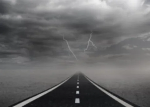 Empty road in sea against lightning in overcast sky Stock Illustration