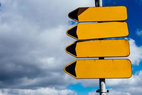 Empty road sign pointers Stock Photos