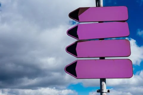 Empty road sign pointers Stock Photos