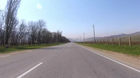 Empty road through countryside Stock Footage 285687051