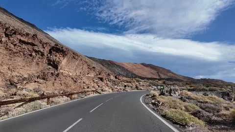 Empty road through volcanic landscape of Tenerife island Video stock 323731135
