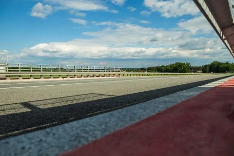 Empty road under blue sky - low angle Stock Photos