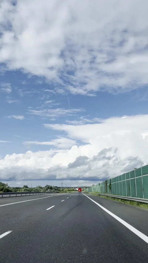 Empty Road Under Cloudy Sky Vertical Stockbeeldmateriaal 344043304