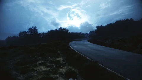 Empty road under the full moon light Stock Footage 97939786