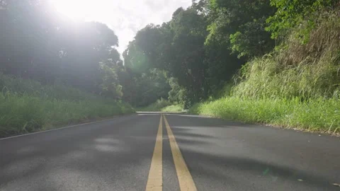 Empty road view surrounded by lush green mountains and rainforest, Stock Footage 141792761