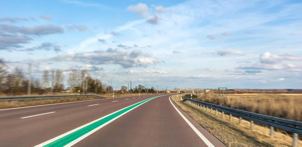 Empty road with visible motion blur. Dynamic driving and transportation scene Stock-Fotos