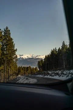 Empty road in winter landscape Stock Photos