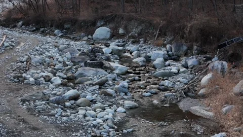 Empty rocky stream in Komagane City, Nagano Prefecture, Japan in winter Stock Footage 299767343