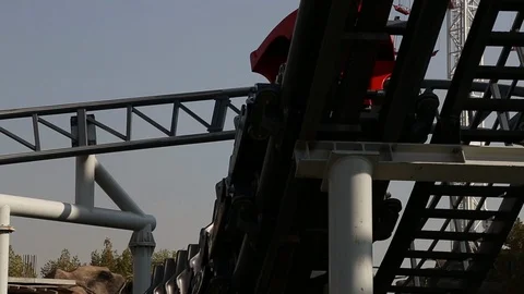 Empty rollercoaster in amusement park footage sequence Stock Footage 100604726
