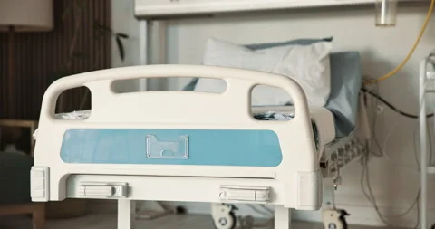Empty, room and bed in hospital for healthcare, wellness or furniture for Stock Footage 341663762