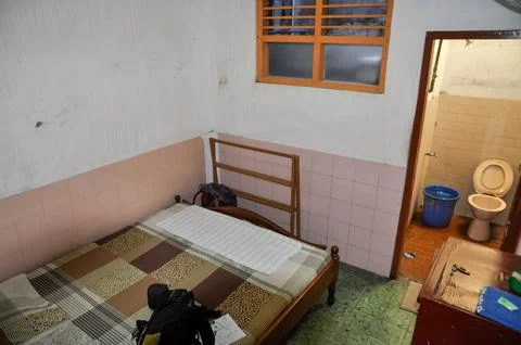 Empty room with bed Stock Photos