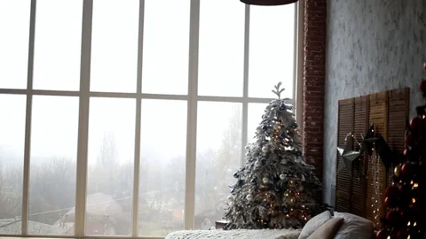 Empty room with a big window with new year's decor Stock Footage 101201566
