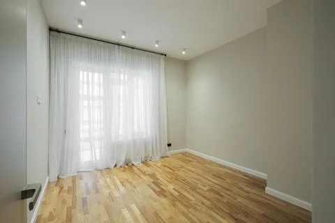 Empty room in bright apartment Fotos Stock