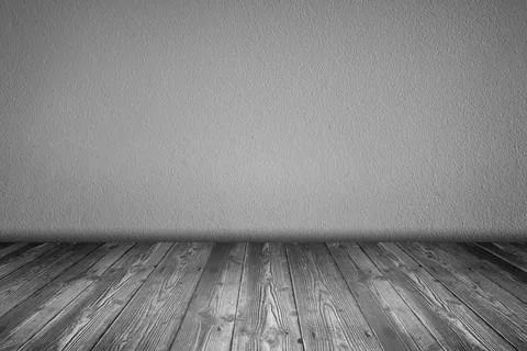 Empty room cement wall and wooden floor Stock Photos