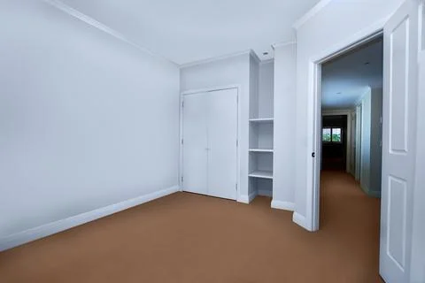 Empty room with a closet Stock Photos