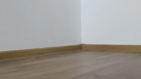 Empty room with new laminate in new apartment Stock Footage 232368802