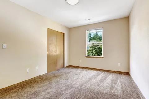 Empty room in soft ivory with closet Stock Photos