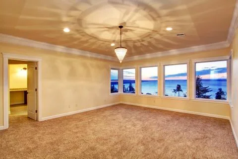 Empty room with sunset window view Stock Photos