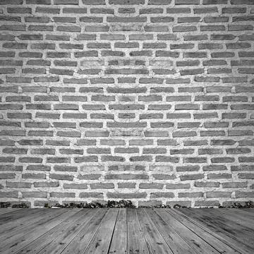 Empty room, white brick wall and wooden floor Stock Photos