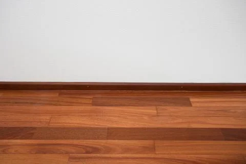 Empty room with white wall and PVC floor Stock Photos