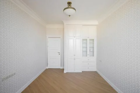 Empty room with white wardrobe Fotos Stock