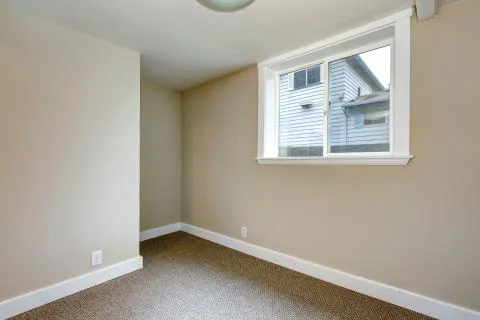Empty room with window Stock Photos