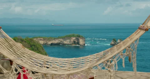 Empty Rope Hammock Hanging Between Trees At Scenic Overlook Of Bali Sea Coast Stock-Footage 343378035