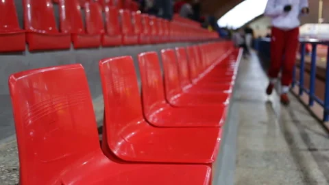 Empty rostrum of the sports complex. To the camera approaching athlete woman. So Stock Footage 85536496