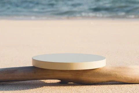 Empty round beige platform podium and dry tree twig on the beach Foto stock