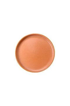 An empty round ceramic plate on a dark, textured brown background. An empty r Stock Photos