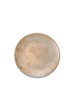 An empty round ceramic plate on a dark, textured brown background. An empty r Stock Photos