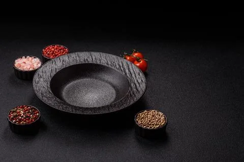 An empty round ceramic plate on a table, kitchenware. An empty plate Stock Photos