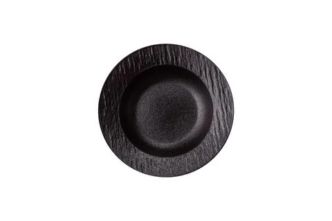 An empty round ceramic plate on a table, kitchenware. An empty plate Stock Photos