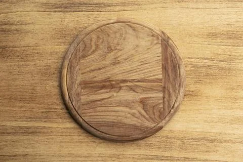 Empty round pizza board Stock Photos