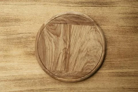 Empty round pizza board Stock Photos